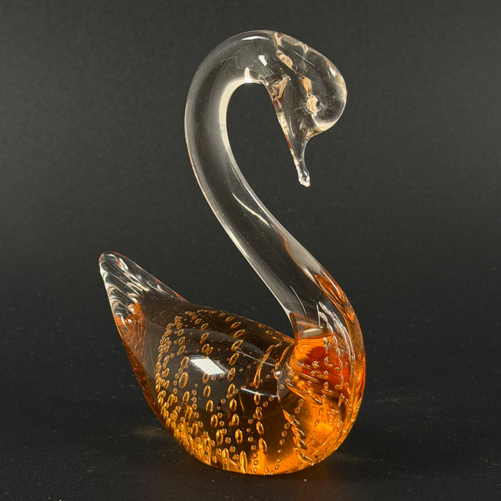 Retro munblåst glas-svan i bärnsten