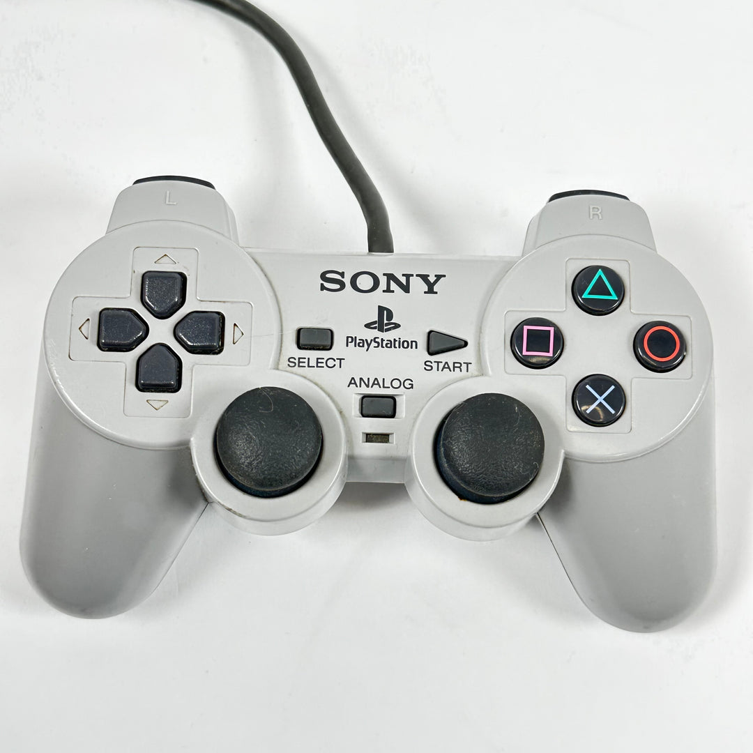 Retro grå Sony PlayStation handkontroll trådbunden