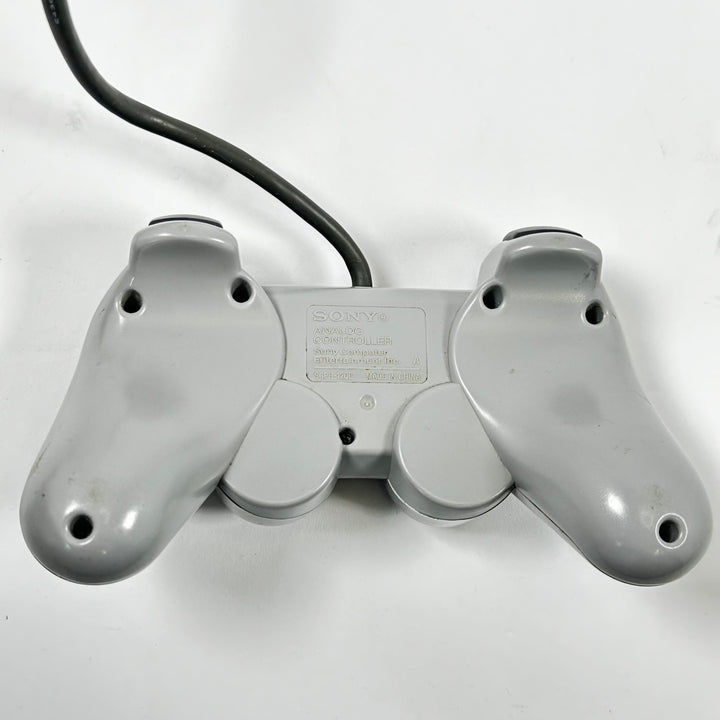 Retro grå Sony PlayStation handkontroll trådbunden