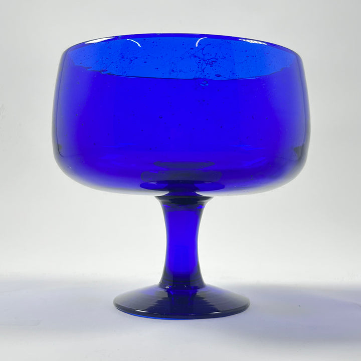 Elegant retro blå glasskål på fot