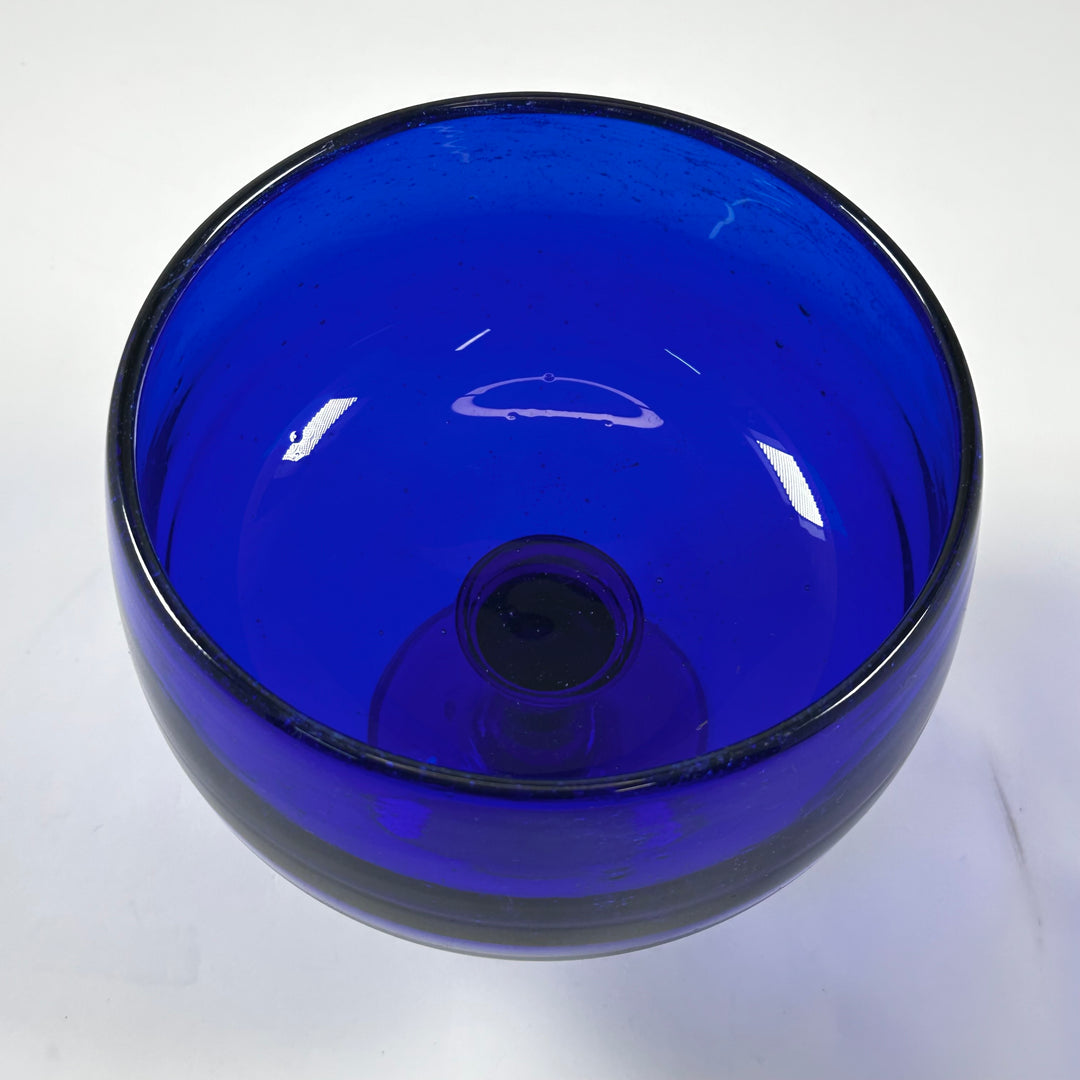 Elegant retro blå glasskål på fot