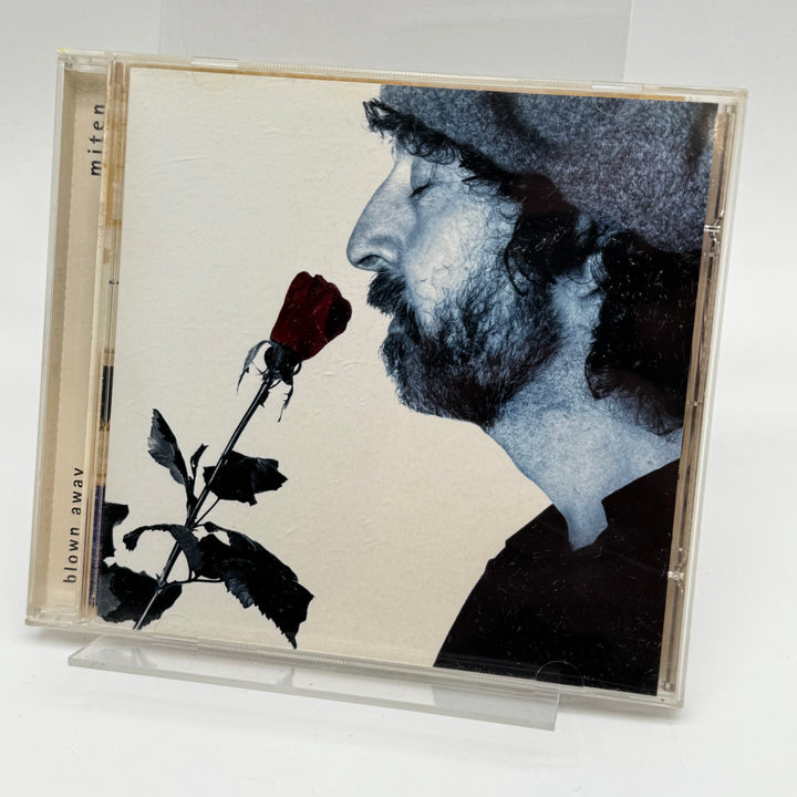 Retro CD-skiva med artistiskt omslag