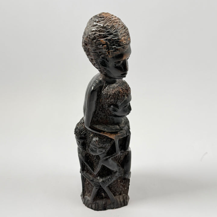 Unik afrikansk träskulptur i mörkt trä