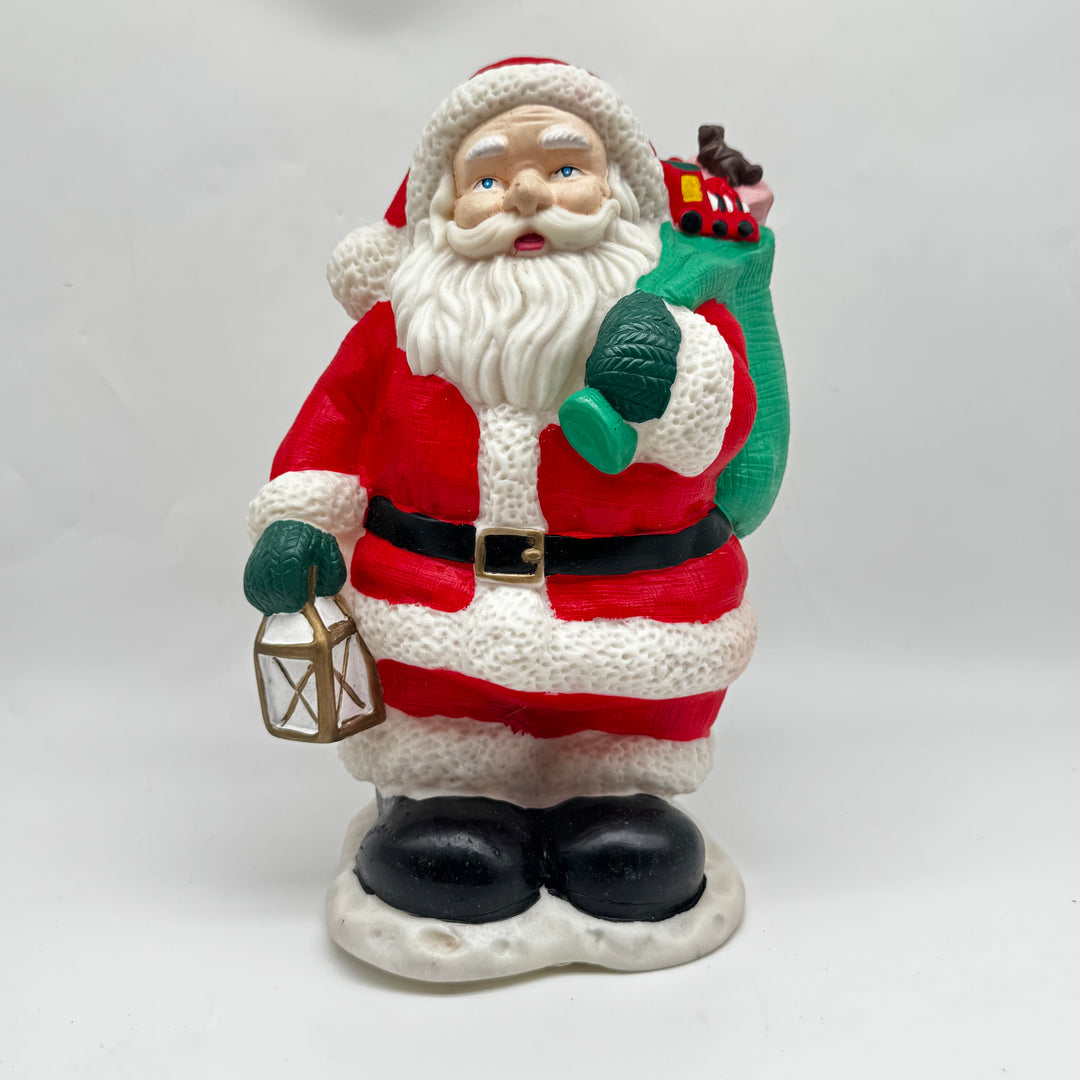 Musikalisk tomtefigur i röd dräkt 25 cm