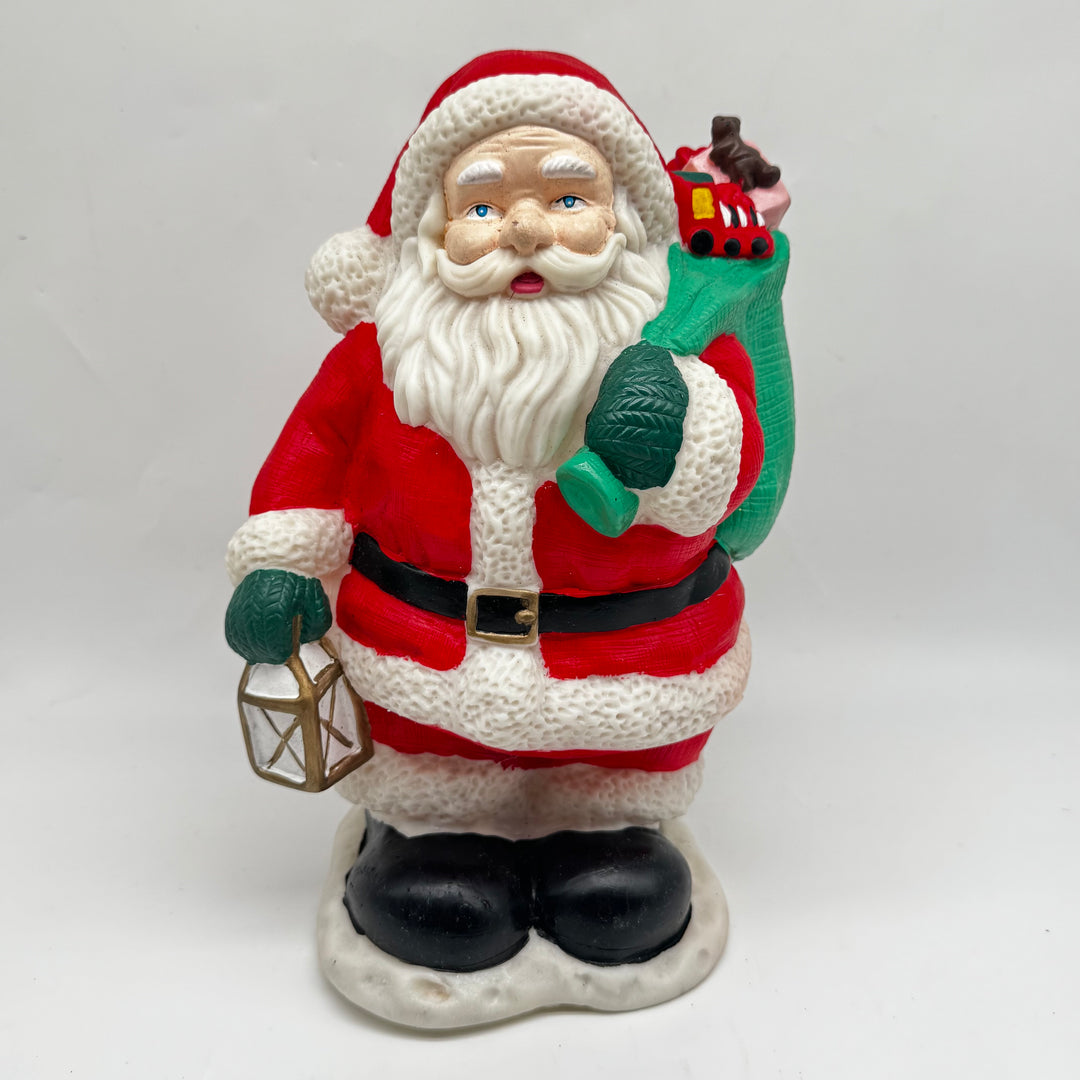 Musikalisk tomtefigur i röd dräkt 25 cm