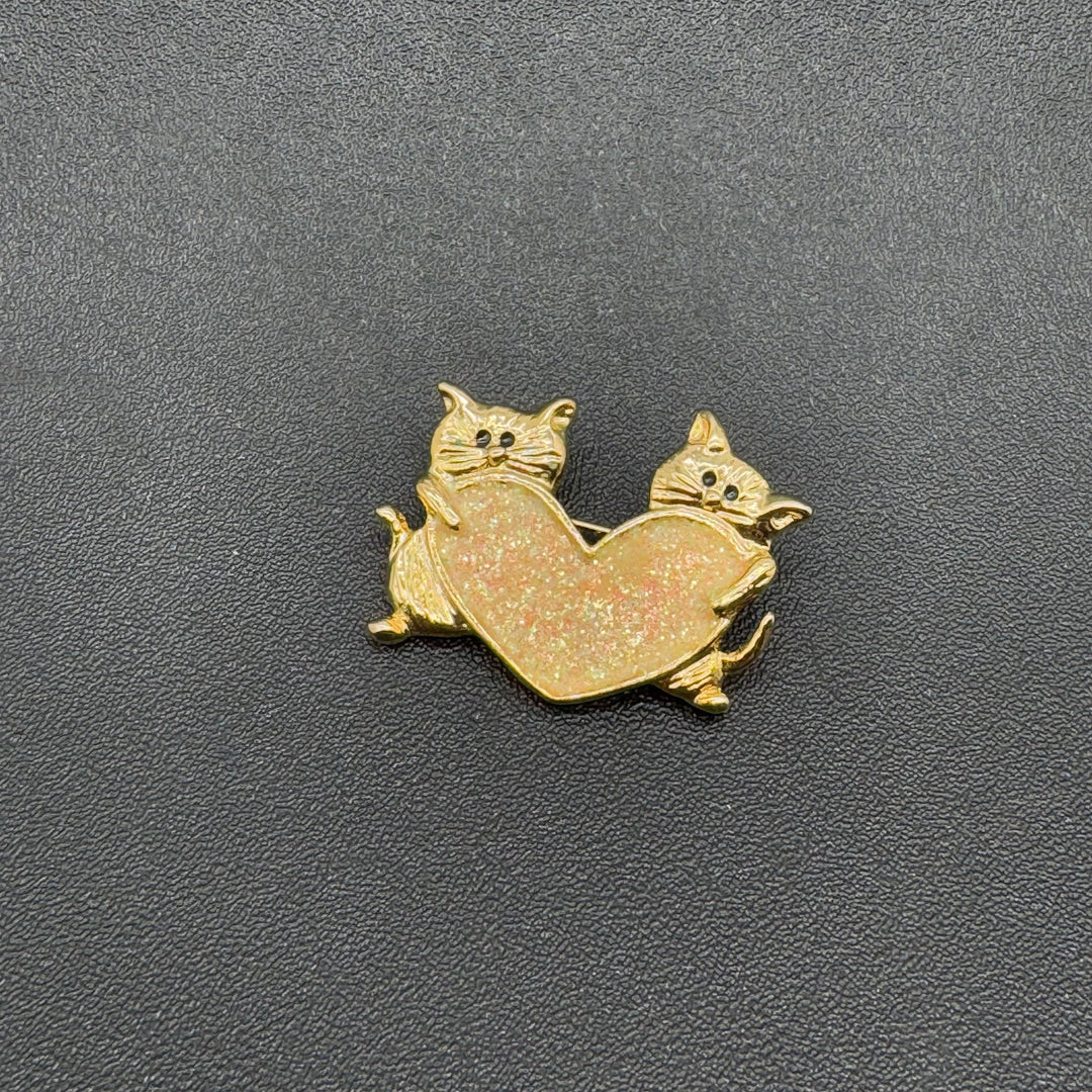 Charmig kattbrosh med hjärtdesign i guld - Homy Secondhand Online