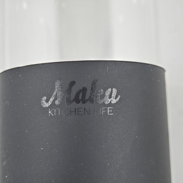 Elegant vattenflaska i glas med silikonhylsa