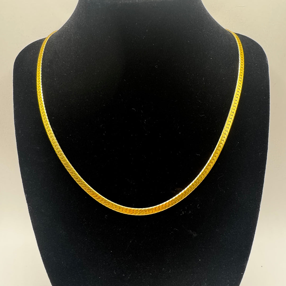Elegant och tidlös halsband i guld