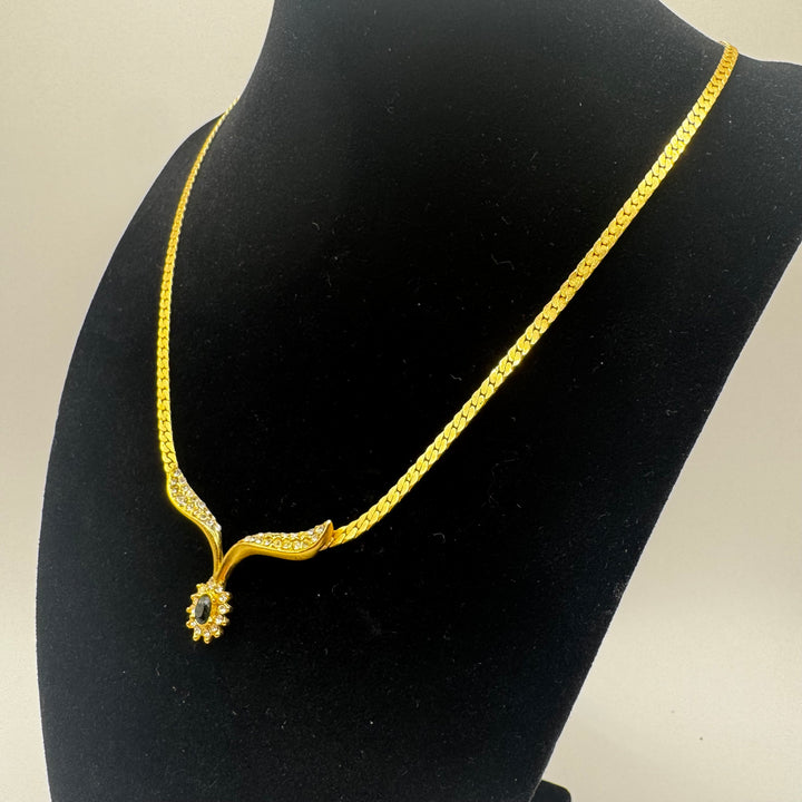 Elegant guldhalsband med kristallblomma