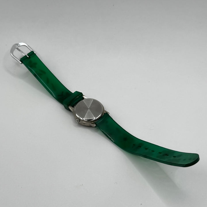 Retroinspirerad Fjms armbandsklocka i grönt plast