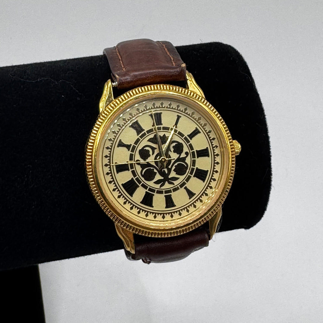 Vintage guldfärgad herrklocka i läder