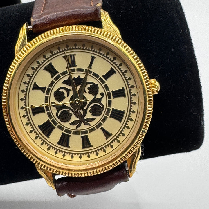 Vintage guldfärgad herrklocka i läder
