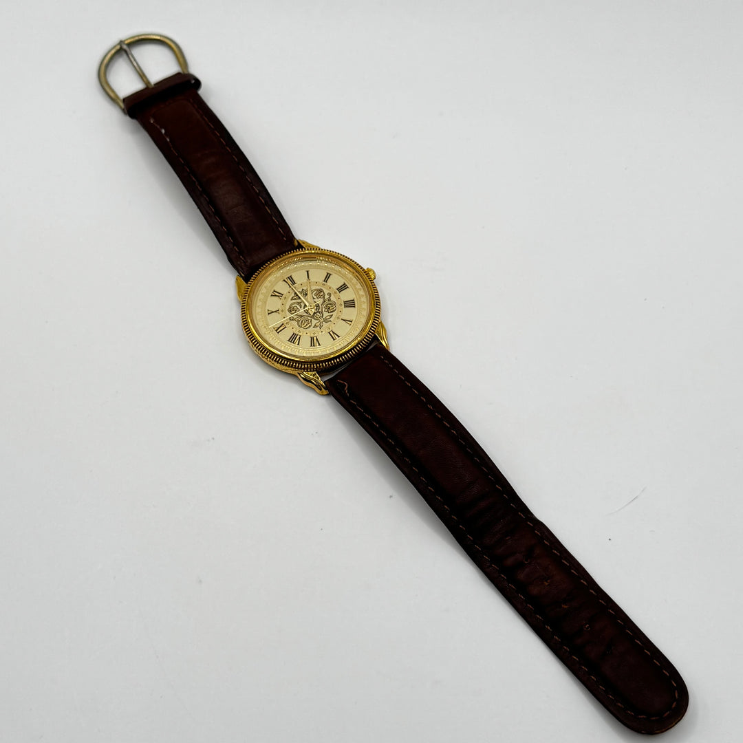 Vintage guldfärgad herrklocka i läder
