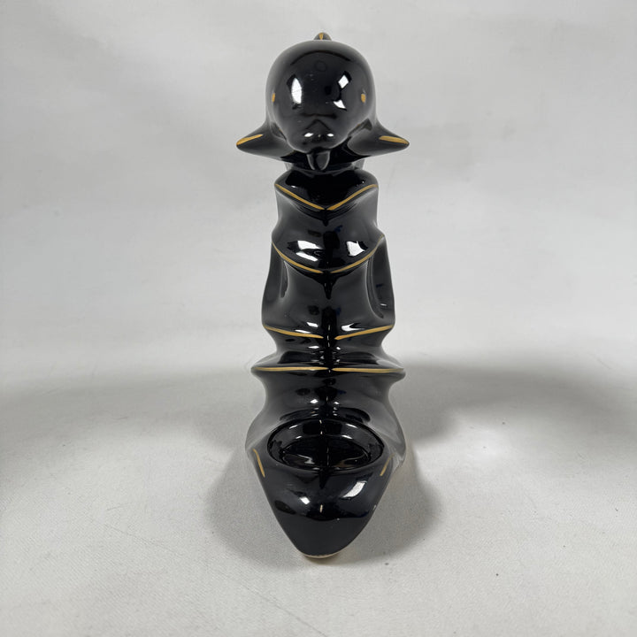 Elegant retro delfinskulptur i keramik med ljushållare