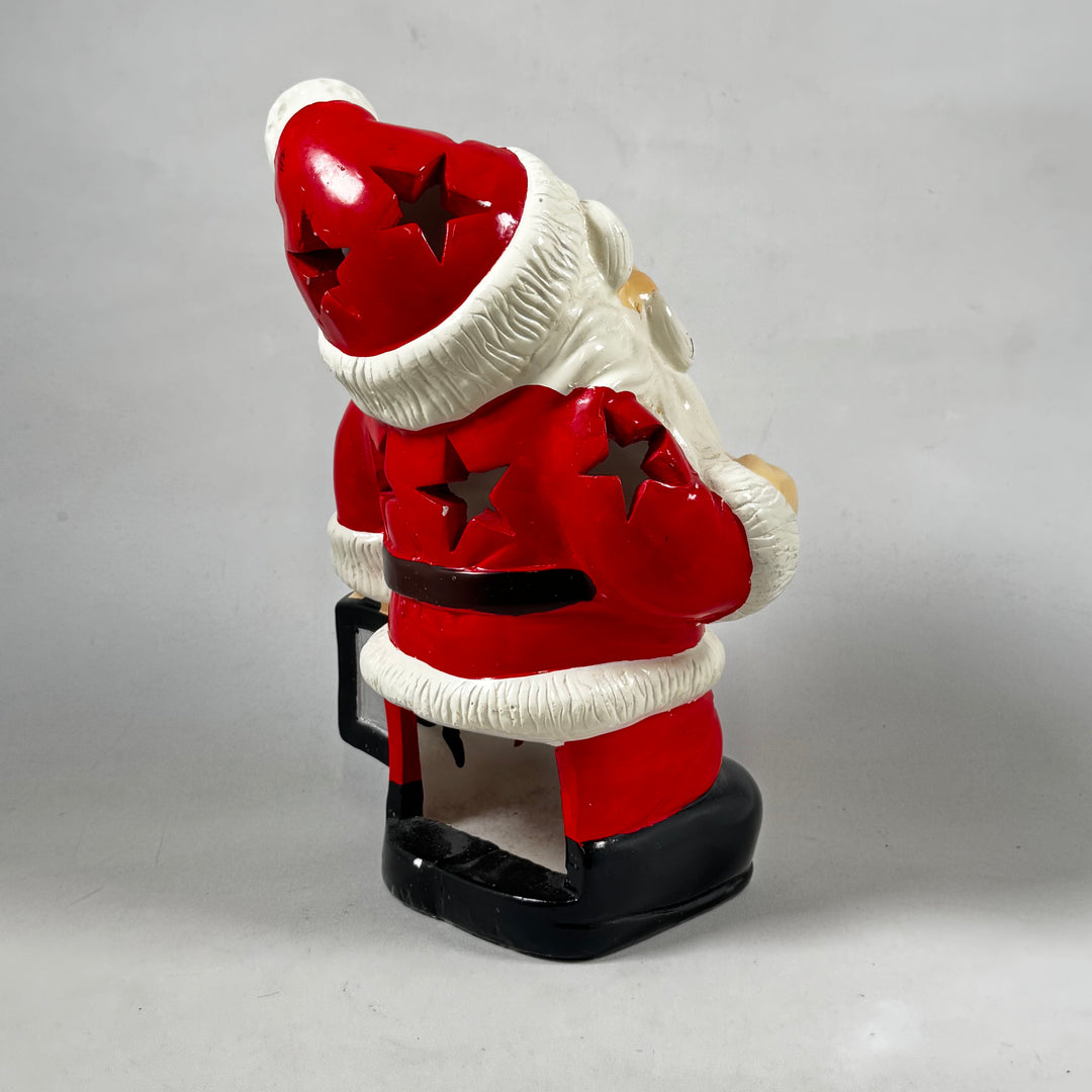 Färgglad retro jultomte i keramik