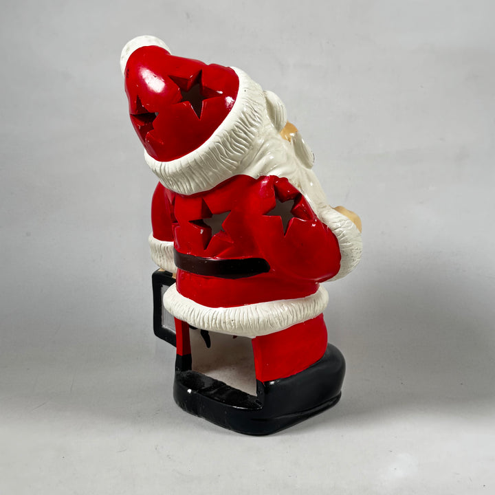 Färgglad retro jultomte i keramik