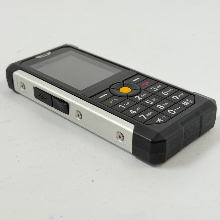 Robust CAT knapptelefon begagnad hållbar modell