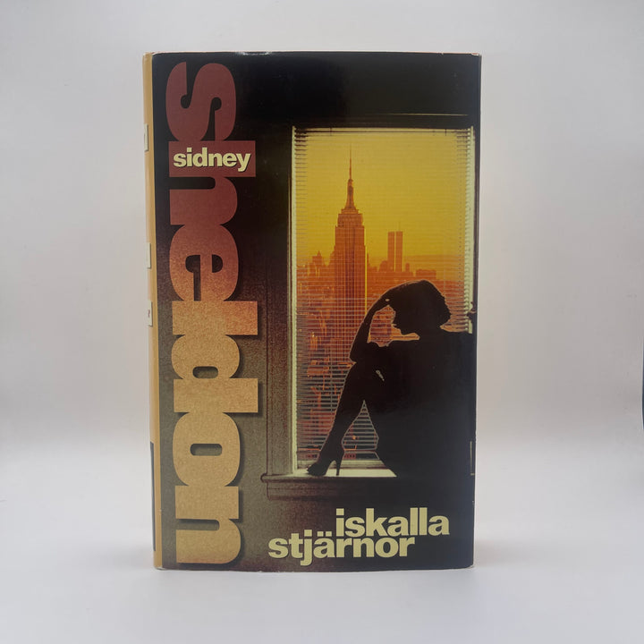 Sidney Sheldon roman Iskalla stjärnor begagnad