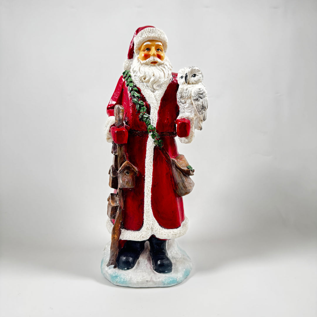 Charmig polystone jultomte med ugglevän