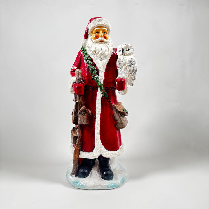 Charmig polystone jultomte med ugglevän
