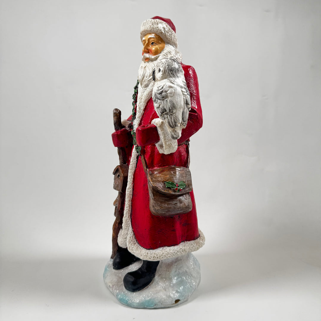 Charmig polystone jultomte med ugglevän