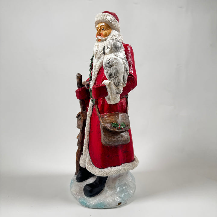 Charmig polystone jultomte med ugglevän