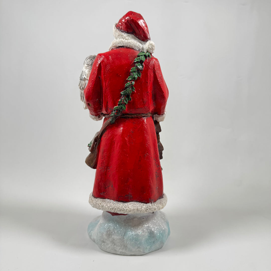 Charmig polystone jultomte med ugglevän