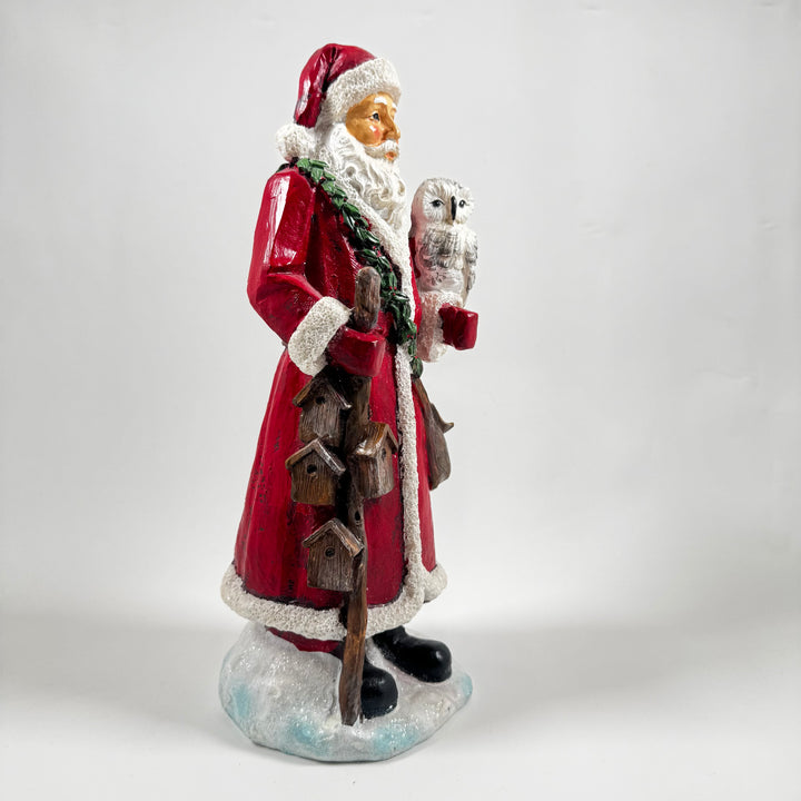 Charmig polystone jultomte med ugglevän