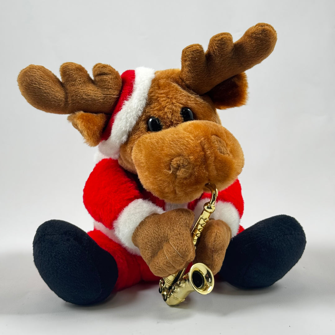 Julren i plysch med tomtedräkt och saxofon