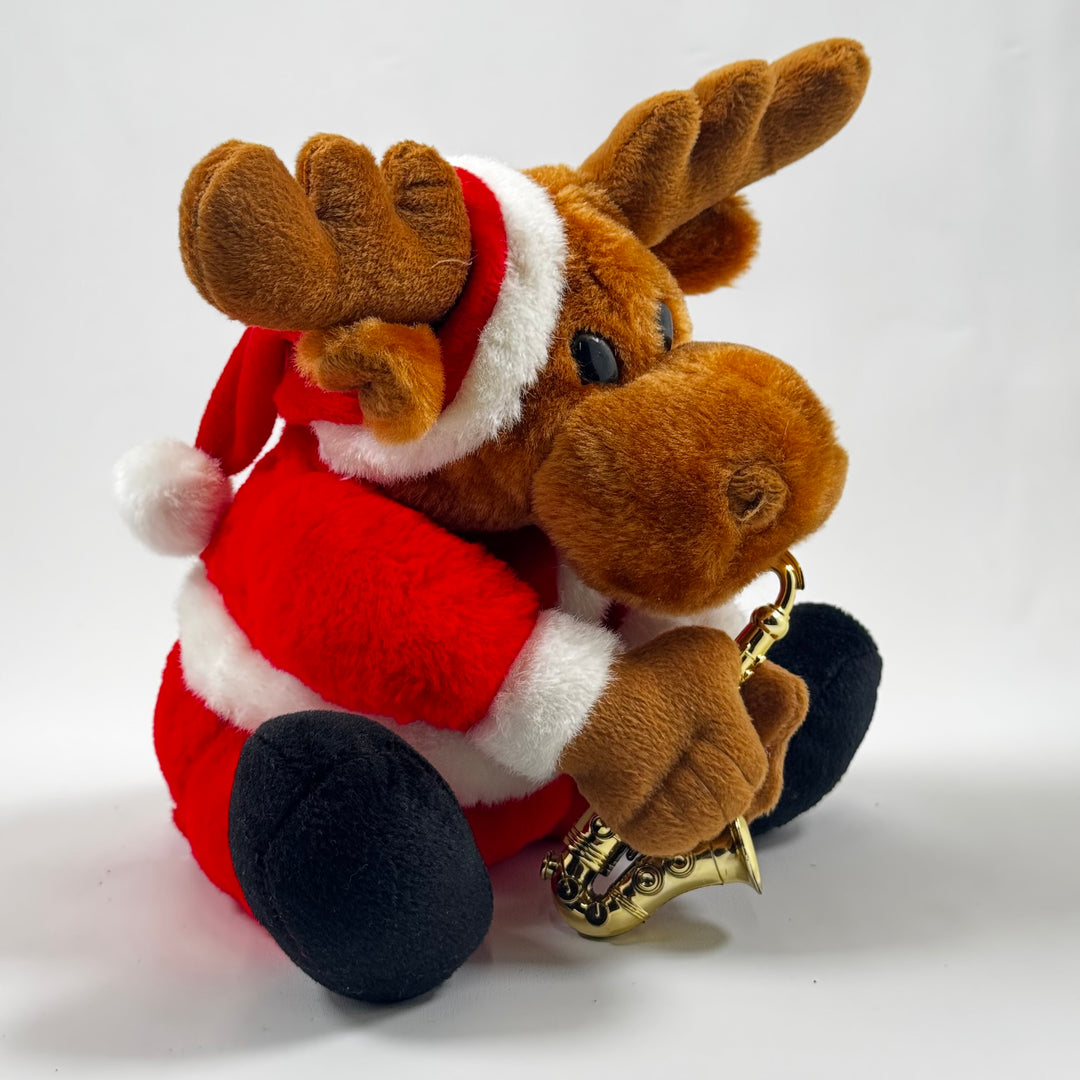 Julren i plysch med tomtedräkt och saxofon