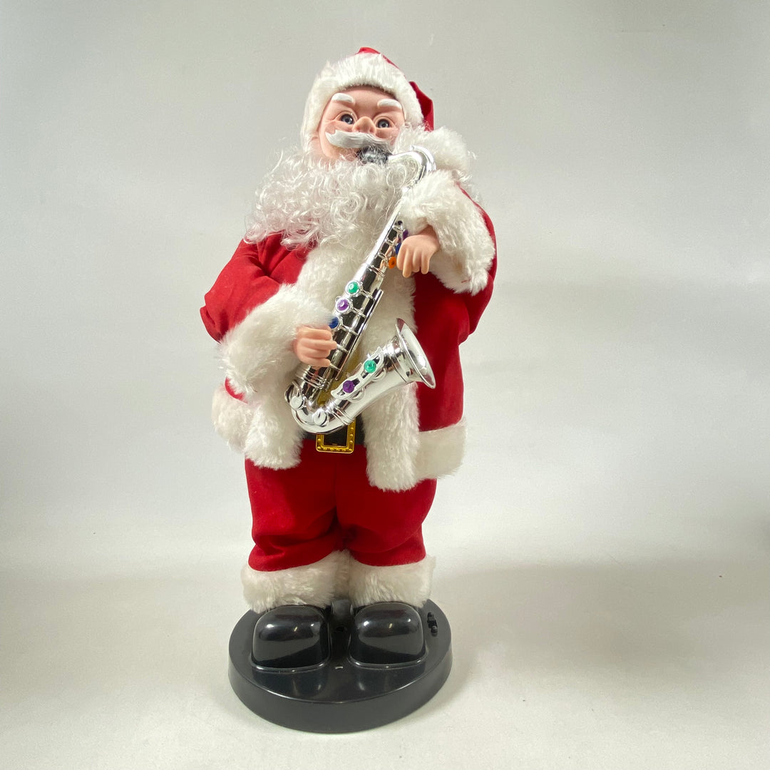 Musikspelande retro jultomte med saxofon