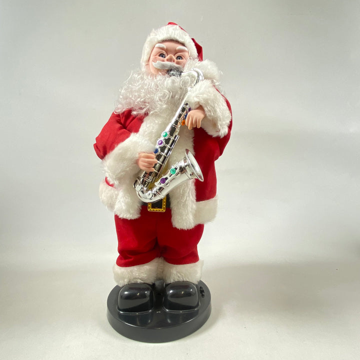 Musikspelande retro jultomte med saxofon