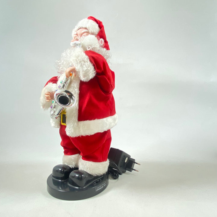 Musikspelande retro jultomte med saxofon