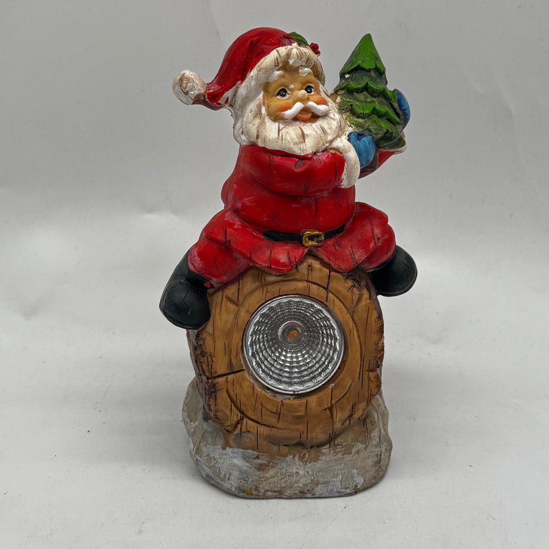 Dekorativ jultomtebelysning i resin från Rusta