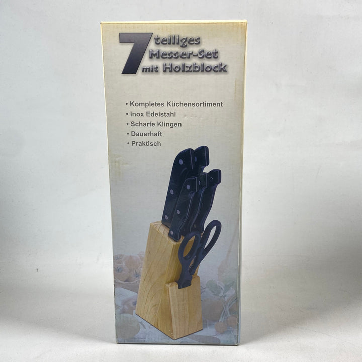 Elegant knivset i rostfritt stål och trä