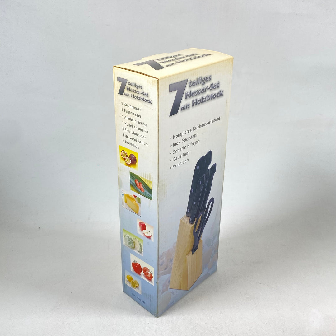 Elegant knivset i rostfritt stål och trä