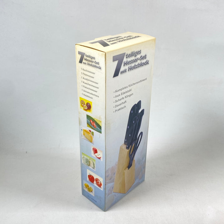 Elegant knivset i rostfritt stål och trä