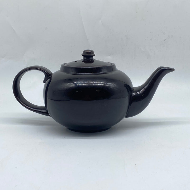 Elegant svart tekanna i keramik