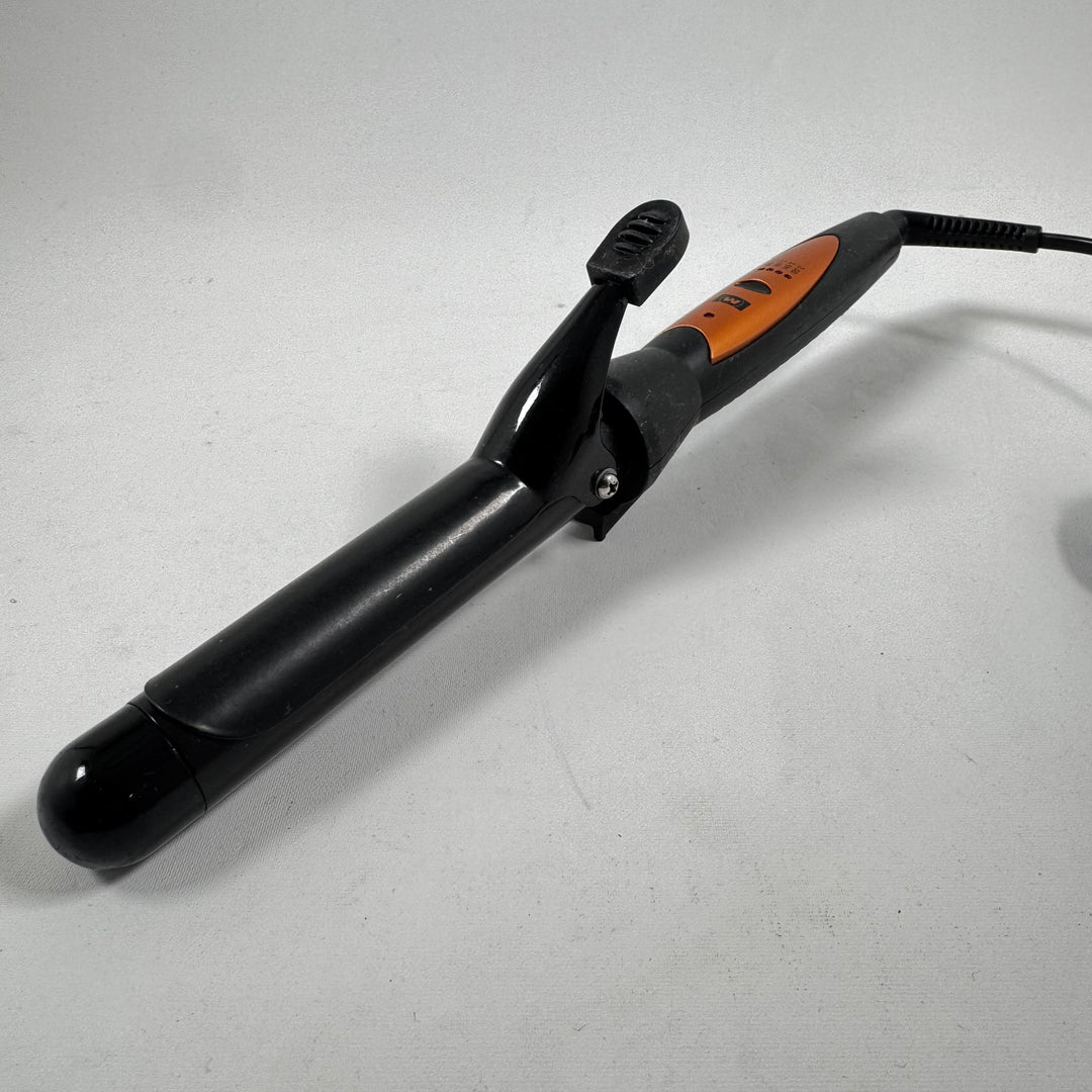 Kompakt hårfön i svart och orange design