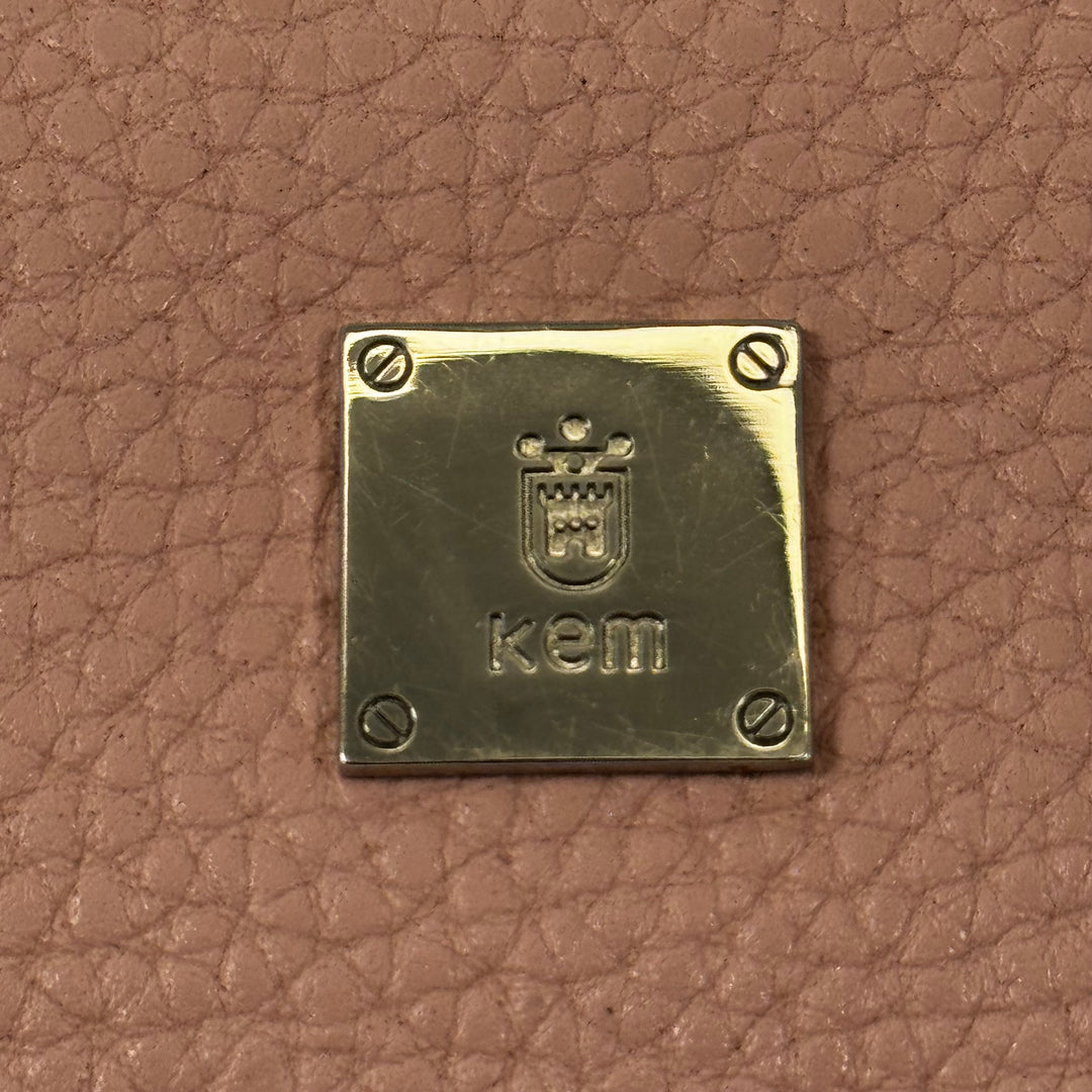 Elegant korallrosa läderhandväskapung från Kem