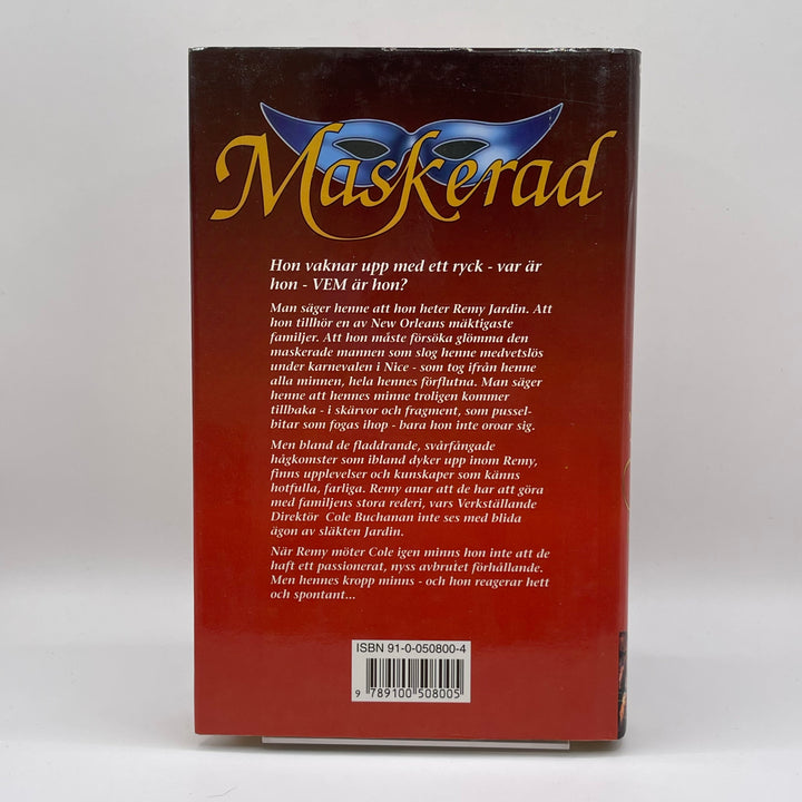 Maskerad av Janet Dailey, romantisk bok