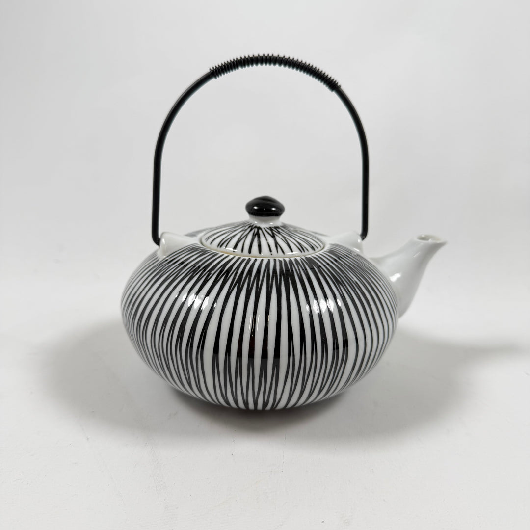 Retro tekanna i porslin med zebramönster