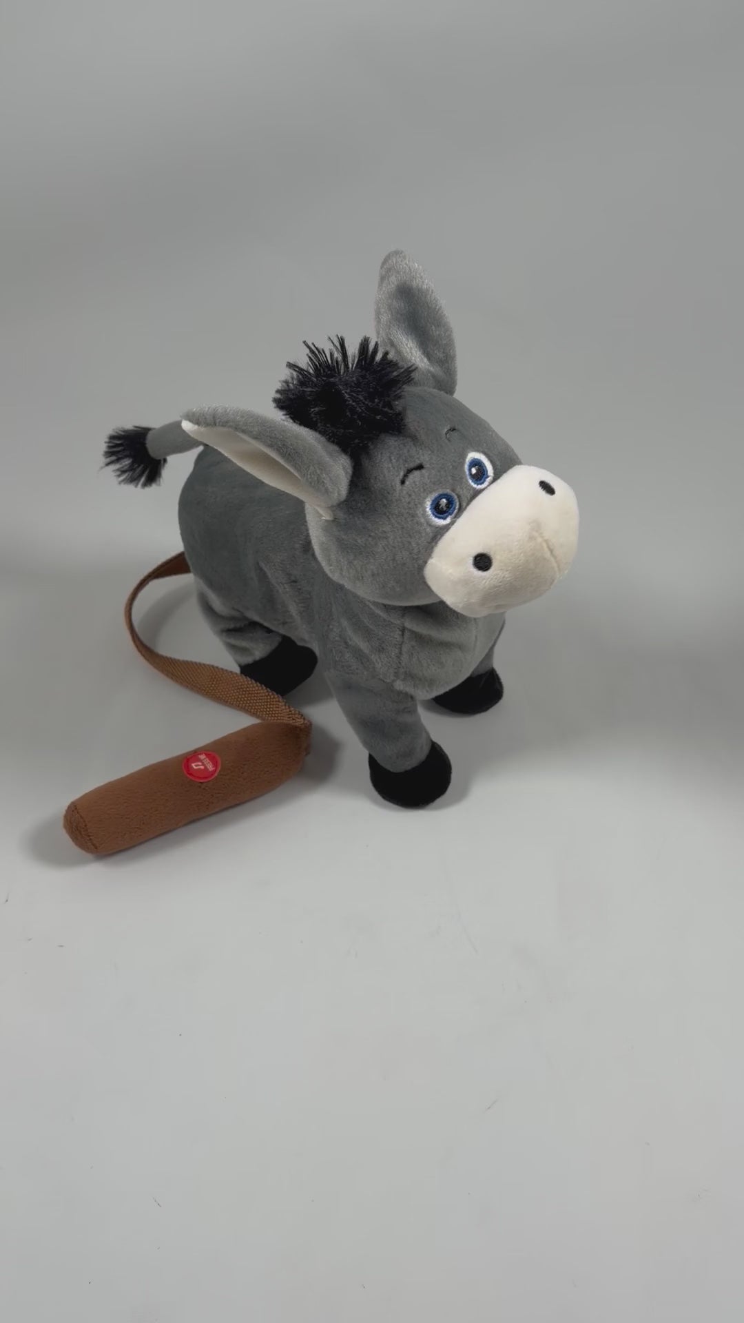 Interaktiv åsna gosedjur med fjärrkontroll